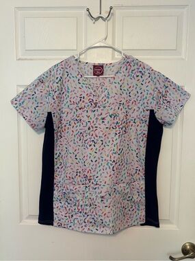 Divine Scrubs JDM White Scrub Top with Multicolor Sprinkle Print and Navy Panels